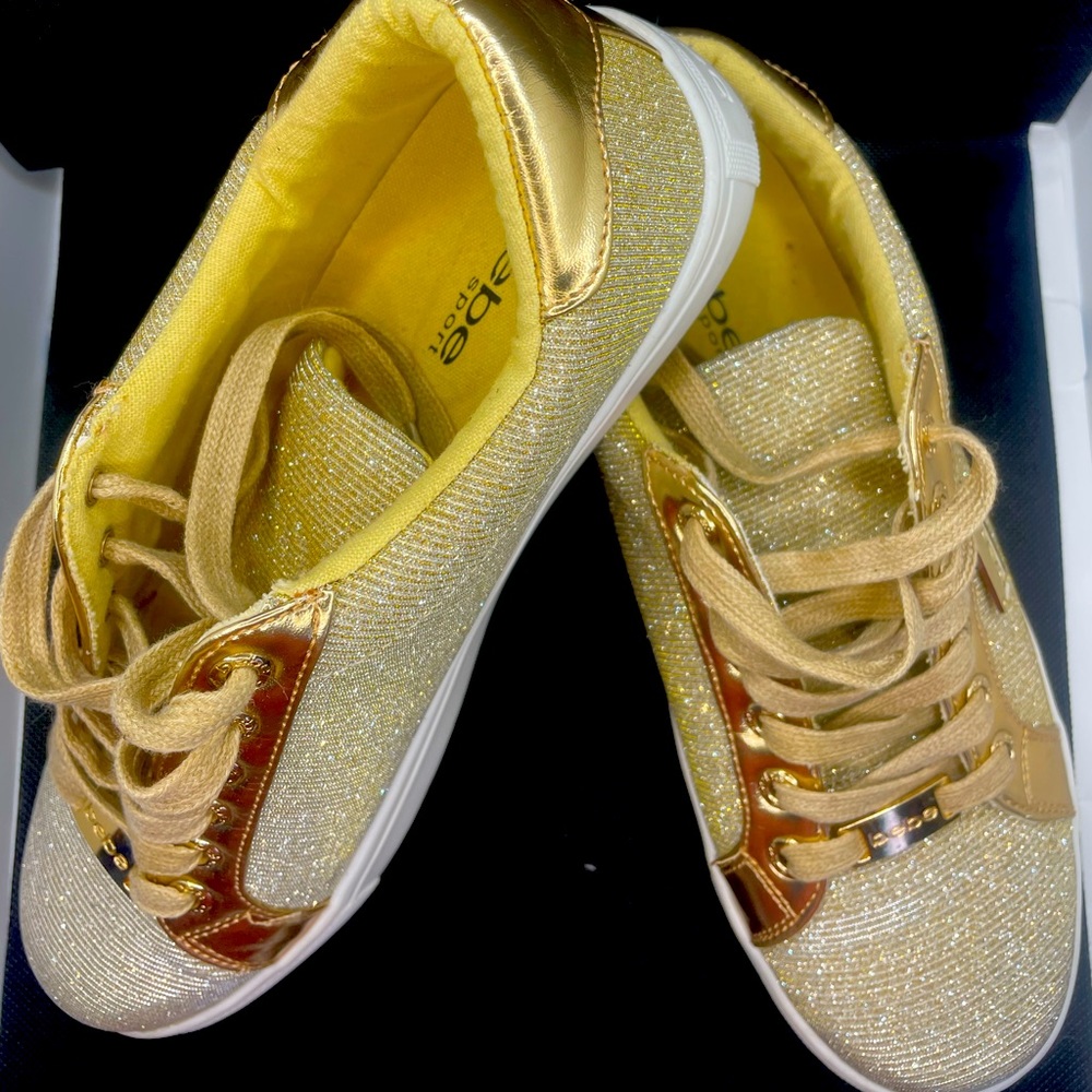 Woman’s BEBE Glittery Gold Sport Shoes